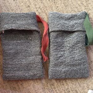 Two exfoliating soap scrubs - sponges that hold the soap inside